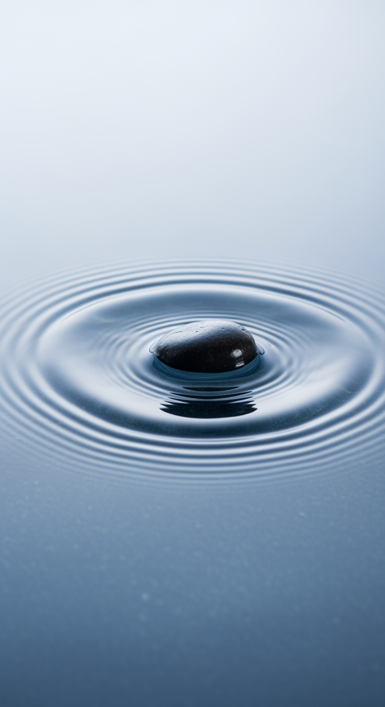 A close-up of a single stone creating a small, perfect ripple in calm water, representing a minor setback in a process.